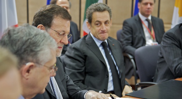 Rajoy, entre Sarkozy y Papademos